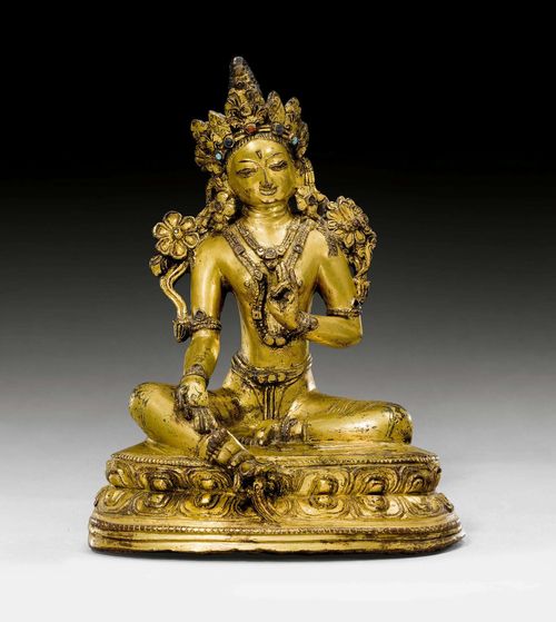 A GILT COPPER FIGURE OF THE GREEN TARA. Tibet, 16th/17th c. Height 18,5 cm. Consecration plate damaged.