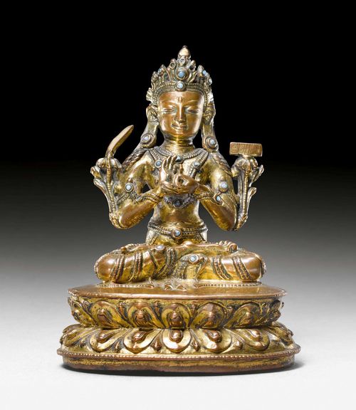 A GILT COPPER FIGURE OF MANJUSHRI WITH GLASS INLAYS. Tibet, 17th c. Height 13 cm. Consecration plate lost. Heavily cleaned.