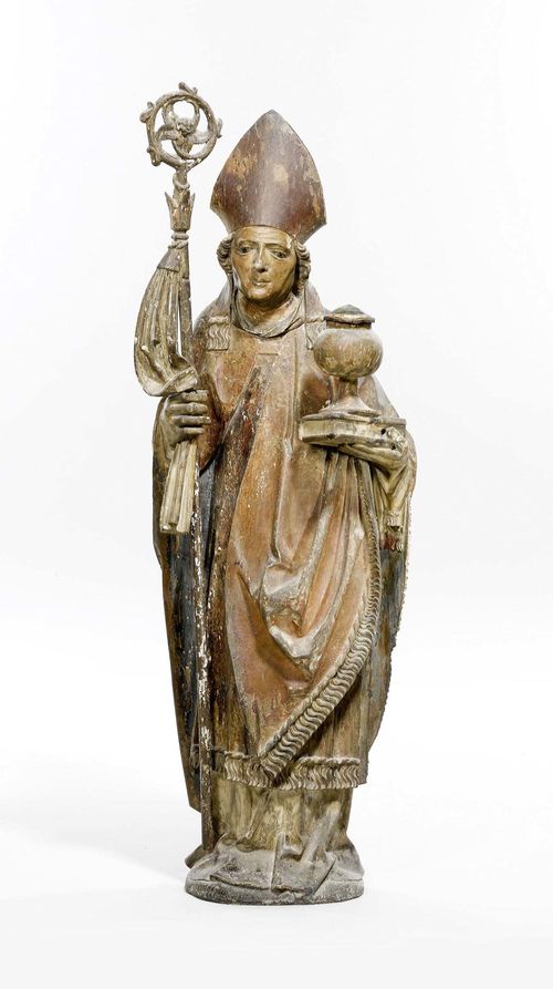 SAINT ELIGIUS,late Gothic, Franconia, late 15th century. Carved and painted limewood, verso hollow. Goblet with crystal in the left hand. H 114 cm.
