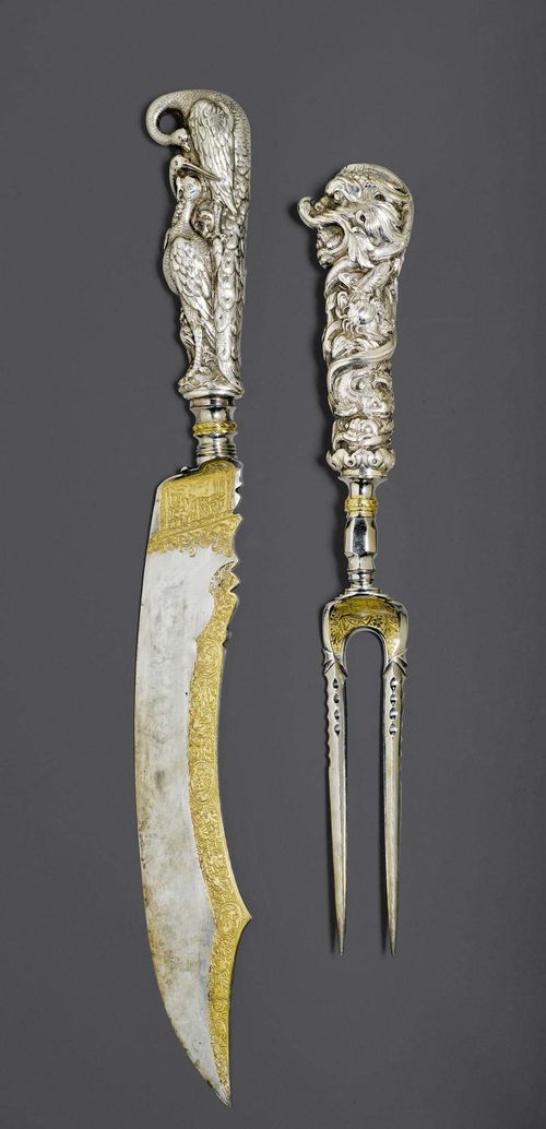 MEAT SERVING SET. Silver plated.After models by Hans Peter Oeri Zurich. The knife with gilt engraving on the blade edge and chased grip. L 38.5 cm. Further models of this grip are located in the Swiss National Museum in Zurich and the Metropolitan Museum of Art in New York. The fork with gilt engraving and chased grip. L 29.5 cm. A further model of this grip is located in the Swiss National Museum in Zurich.
