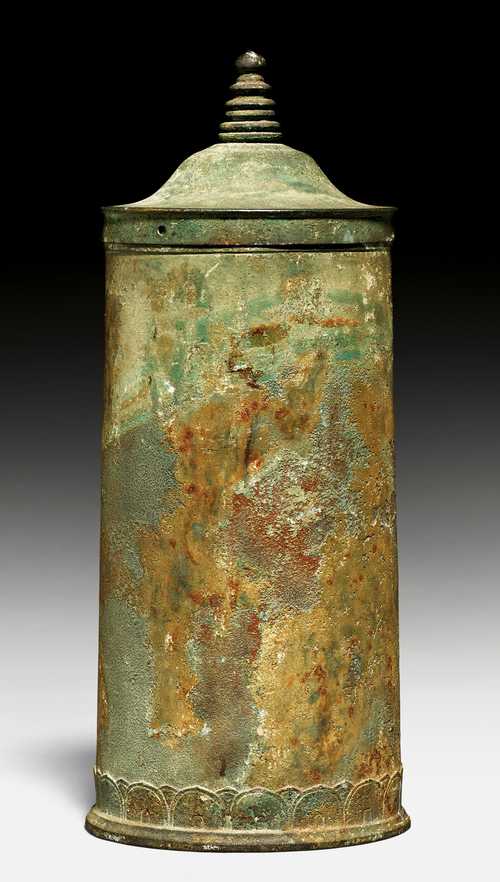 A CYLINDRICAL BRONZE SUTRA CONTAINER.