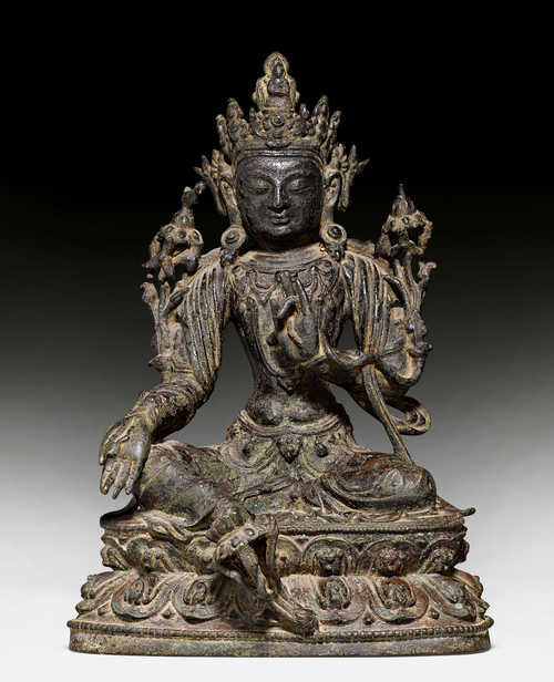 A BRONZE FIGURE OF GUANYIN.