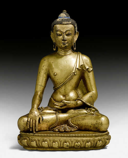 铜鎏金釋迦摩尼佛像。