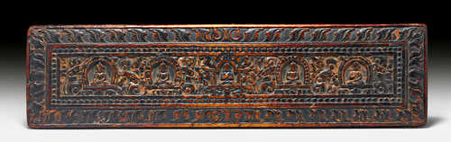 A WOODEN SUTRA COVER.