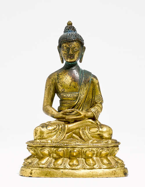 A GILT-BRONZE FIGURE OF A SEATED BUDDHA.