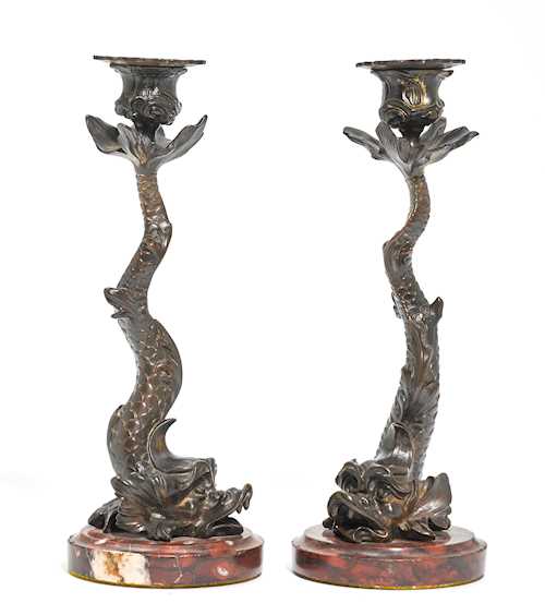 PAIR OF CANDLESTICKS DESIGNED AS DOLPHINS,