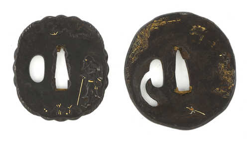 TWO IRON TSUBA WITH INLAID GOLD DETAILS.