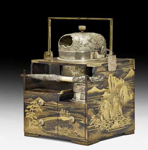 A LACQUER SMOKING SET FINELY DECORATED WITH LANDSCAPES (TABAKO-BON).