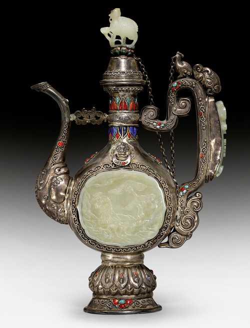 A FINE SILVER EWER DECORATED WITH CELADON JADE CARVINGS.