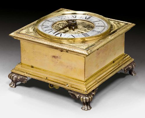 TABLE CLOCK,early Baroque, signed CASPARUS ZURBIN M STOCKHOLM (Casparus Zurbin, active in Stockholm from 1640-1665), Sweden circa 1650. Gilt bronze and brass. The chapter ring engraved with landscape. Fine brass movement with 4/4 striking on 2 bells. Requires servicing. 13.5x13.5x9.5 cm.