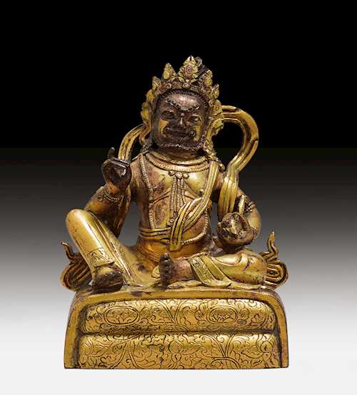 鎏金青銅俱毗罗财神佛像。