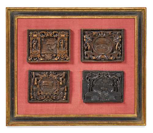 A COLLECTION OF 8 SMALL CARVED RELIEFS