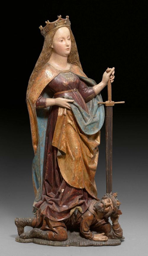 SAINT CATHERINE,late Gothic, probably Franconia circa 1480/1500. Carved limewood, verso hollowed and painted. H 123 cm. The paint retouched.