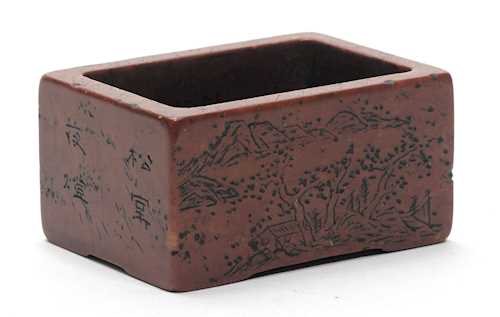 A SOAPSTONE BRUSH WASHER.