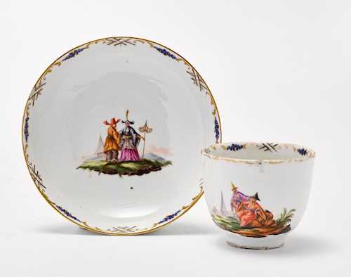 A CUP AND SAUCER