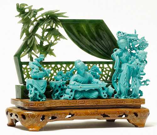 A FINE CARVING WITH QIN PLAYER.