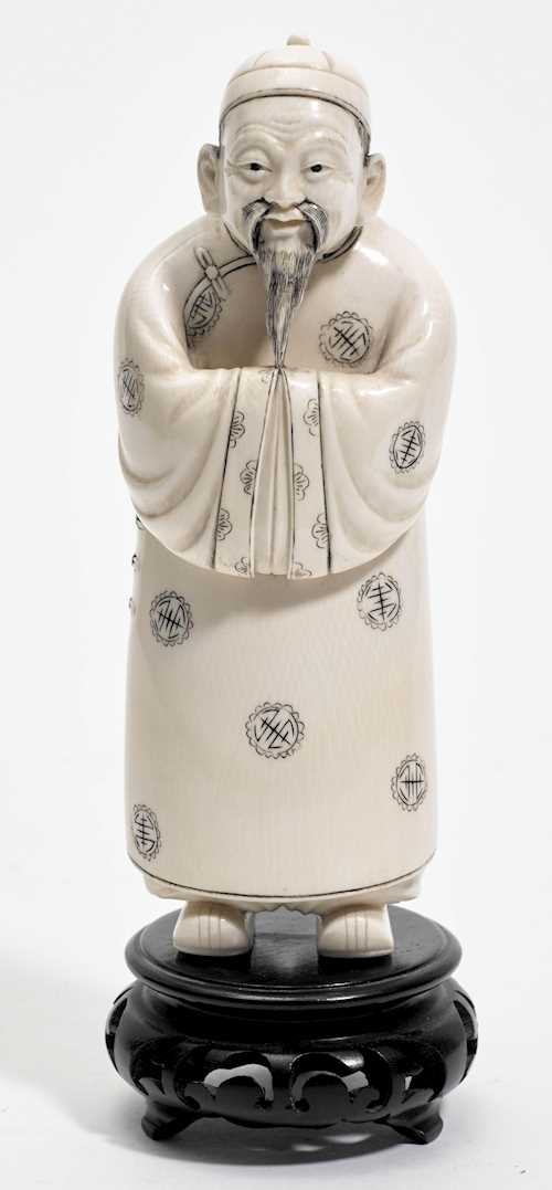 AN IVORY FIGURE.