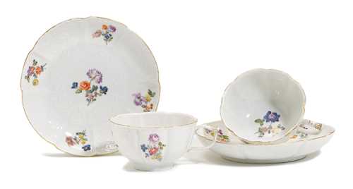 A PAIR OF GOTZKOWSKY-MOULDED CUPS AND SAUCERS