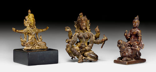 VASUDHARA, INDRA AND A MANDALA DEITY ON A LION MADE FROM DIFFERENT COPPER ALLOYS.
