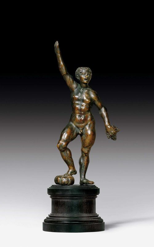 SMALL BRONZE FIGURE OF BACCHUS,Renaissance, probably Tuscany circa 1650. Patinated bronze. On ebonised wooden plinth. H (with plinth) 28 cm.