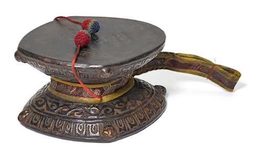 A WOODEN DAMARU.