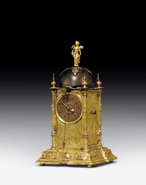 TURRET CLOCK,Renaissance, probably Augsburg circa 1650. Gilt, finely chased bronze. The front with silver-plated bronze chapter ring. Verso with bronze dial for alarm setting and free swinging pendulum. Verge escapement with gut string winding and striking on bell. Area of loss, requires servicing. 11x11x21 cm. Provenance: - Former Flannery collection, Mentmore Castle. - European private collection.