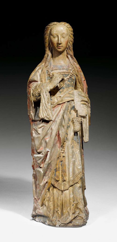 FIGURE OF SAINT MAGDALENE,France, Burgundy circa 1500. Sandstone with remains of painting. In her left hand she holds parts of a cover of an ointment vessel. Right hand missing. Chips. Head reattached, nasal wing retouched. H 142 cm.