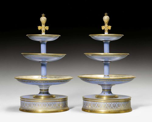 PAIR OF 'ETAGERES A TAMBOUR”,Sevres, circa 1840. From a dessert service. Crowned monogram LP, Sevres and 1840 printed in blue. H 45.5 cm. (2)