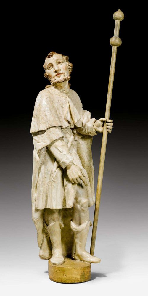 SAINT ROCH,probably by J. B. BABEL (Johann Baptist Babel, 1716-1799), Switzerland, 2nd half of the 18th century. Carved wood with white paint, verso hollowed. Hands and staff, not original. H 128 cm. Provenance: From a German private collection.