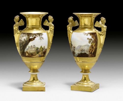 PAIR OF 'EMPIRE' VASES 'AUX VUES DE TIVOLI ET DU PORT ANTIQUE D'OSTIA',Paris, circa 1820. 'Forme ovoid', gilt, each with a romanticized landscape veduta: one with the ancient port of Ostia, the other with the Temple of Vesta and Temple of the Sibyl in Tivoli in a mountain landscape. Etched gold medallion verso. Gilding rubbed at the edges. H 36 cm. (2)