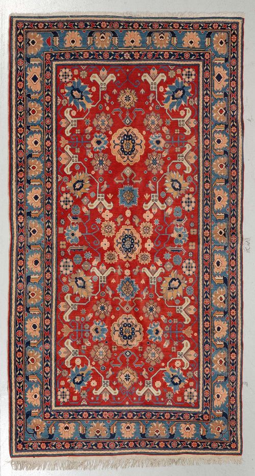 DERBEND old.Red ground, patterned throughout with stylized trailing flowers, light blue edging, 150x265 cm.