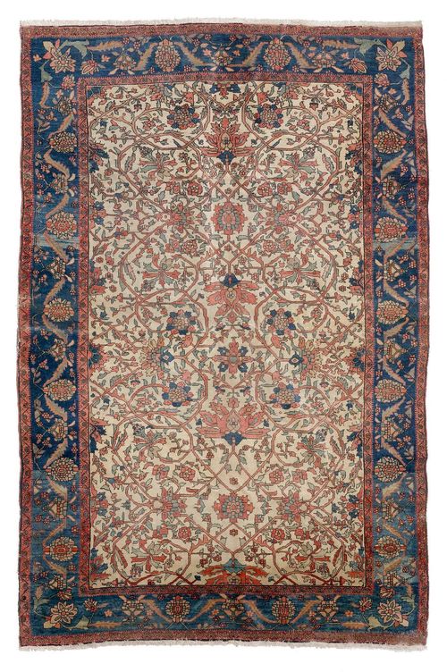FERAGHAN antique.White ground, patterned throughout with trailing flowers, dark blue edging, strong signs of wear, 130x200 cm.