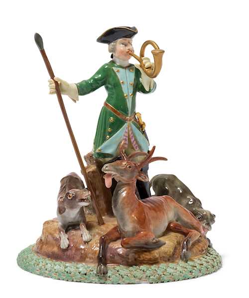 A FIGURAL COVER WITH HUNTING SCENE