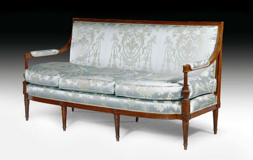 CANAPE,Louis XVI, probably by G. JACOB (Georges Jacob, maitre 1765), Paris circa 1790. Fluted and exceptionally finely carved mahogany. Light gray silk cover. 3 seat and 2 support cushions. 176x58x54x95 cm.
