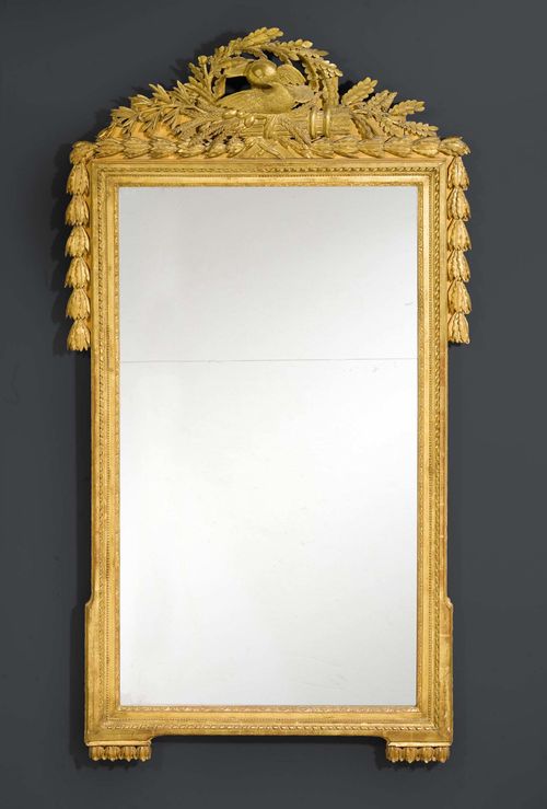 LARGE MIRROR "AUX COLOMBES D'AMOUR",Louis XVI, Paris circa 1780. Carved wood. Old, two-part mirror plate. H 210 cm, W 120 cm. Provenance: Galerie Koller Zurich auction on 11.9.1998 (Lot No. 639).