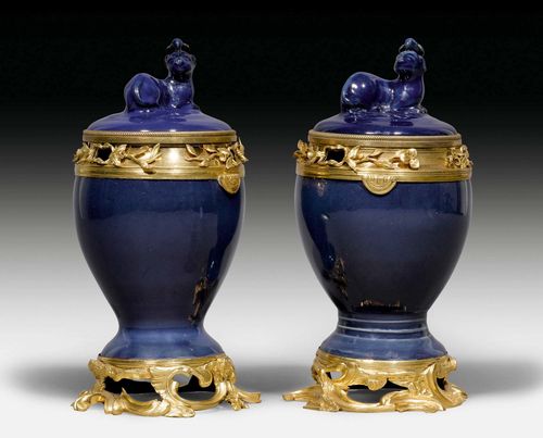 PAIR OF POTPOURRI VASES,Louis XV, the porcelain probably China, 18th century, the bronze Paris, 19th century. Blue porcelain and gilt bronze. H 24 cm.