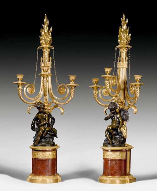 PAIR OF IMPORTANT CANDELABRA "CUPIDON ET INNONCENCE",Louis XVI, attributed to F. REMOND (François Rémond, circa 1745-1812), most likely in collaboration with D. DAGUERRE (Dominique Daguerre, died 1796), the figures after designs by E.M. FALCONET (Etienne-Maurice Falconet, 1716-1791), Paris circa 1790/95. Matte and polished gilt bronze, burnished bronze, and "Griotte Rouge" marble. H 100 cm. Provenance: - Private collection, USA. - Christie's New York auction, 24.11.2009 (Lot No. 189).