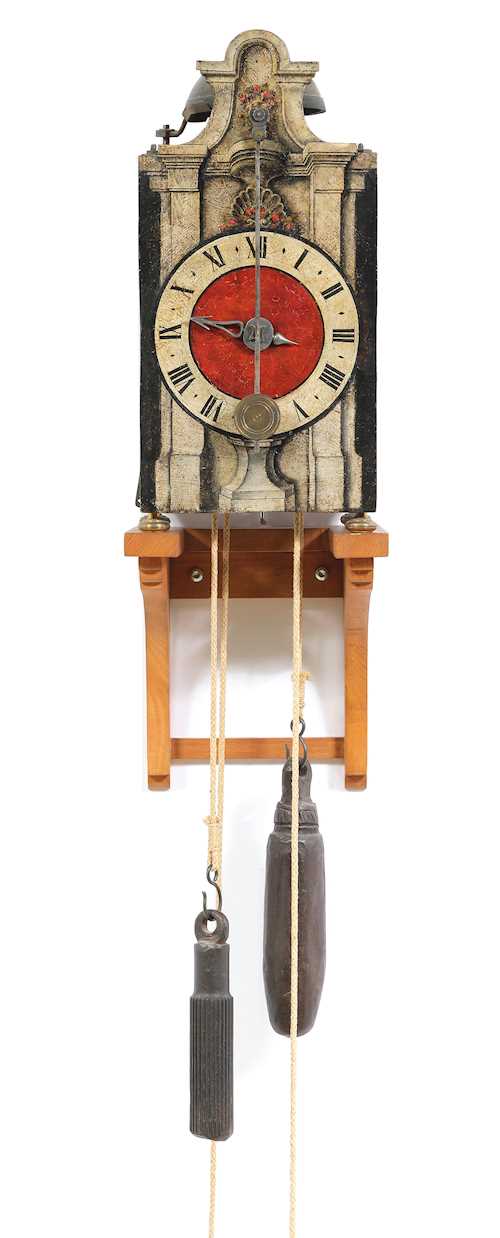 ONE-HANDED IRON CLOCK WITH FRONT PENDULUM