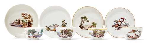 LOT OF FOUR TEA BOWLS AND SAUCERS DECORATED WITH LANDSCAPES AND BIRDS