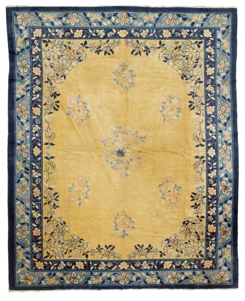 CHINA antique.Yellow central field with flower motifs and floral corner motifs, light blue edging, slight wear, 310x380 cm.