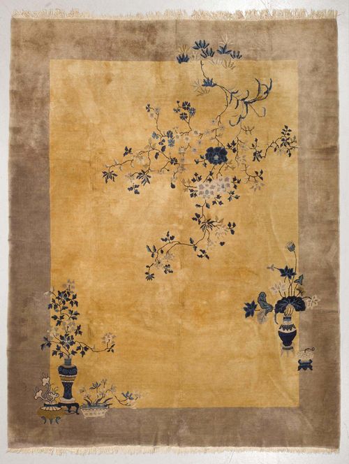 CHINA.Yellow central field with two  vases and floral motifs, grey edging, 250x290 cm.