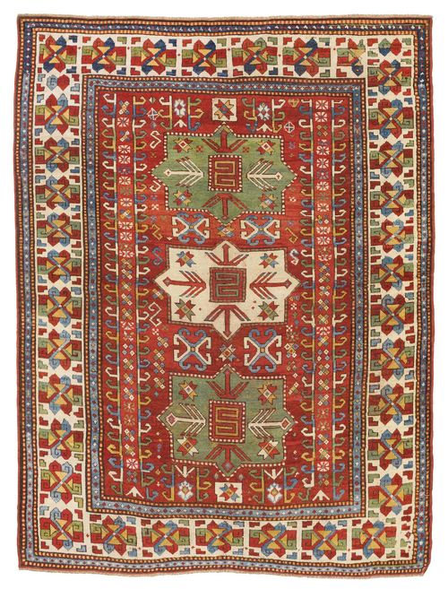 FACHRALO antique.Red ground with three medallions, geometrically patterned, wide edging in white with star motifs, restored in some areas, 170x220 cm.