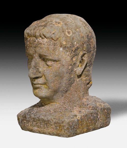HEAD OF TIBERIUS,in the style of the Antique, probably Italy, 18th/19th century. Gray, heavily weathered sandstone. H 48 cm.