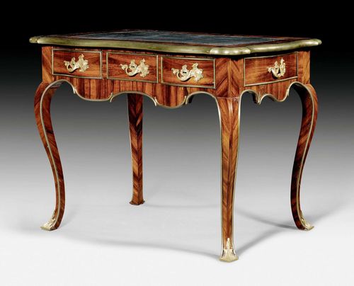 SMALL BUREAU PLAT,Louis XV, Potsdam circa 1750. Rosewood in veneer. The top lined with gold-stamped, black leather and edged in brass. The front with 3 adjacent drawers. Same, but sham arrangement verso. 1 lateral drawer on each side. Exceptionally fine, matte and polished gilt bronze mounts and applications, as well as brass trim. 107x70x79 cm. Provenance: from a German private collection, acquired in Maastricht in 2002.