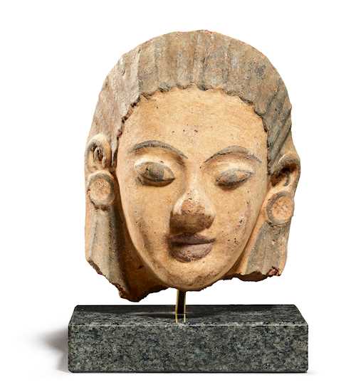 ANTEFIX DESIGNED AS THE HEAD OF A WOMAN