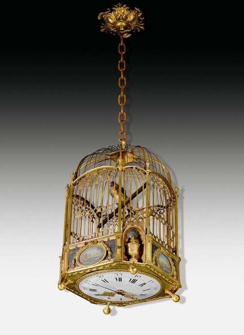 VOGELKÄFIGUHR MIT MUSIKAUTOMAT,