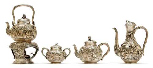 A SILVER TEA AND COFFEE SET BY WATANABE.