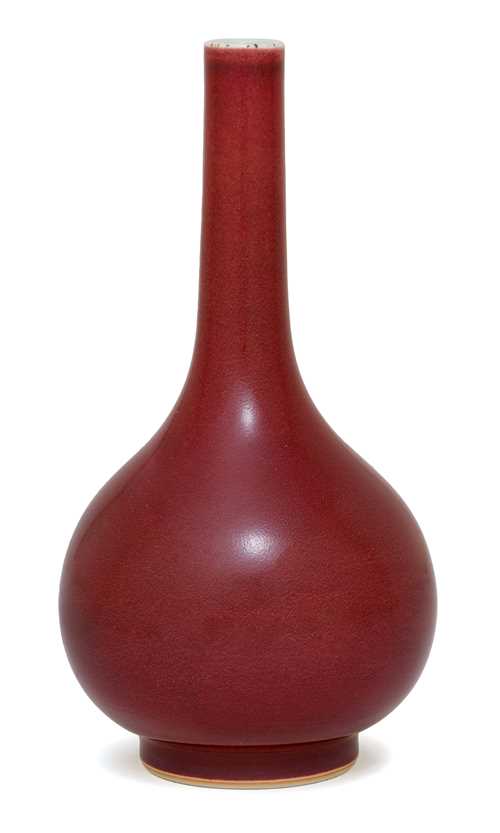 A SMALL COPPER RED GLAZED VASE.
