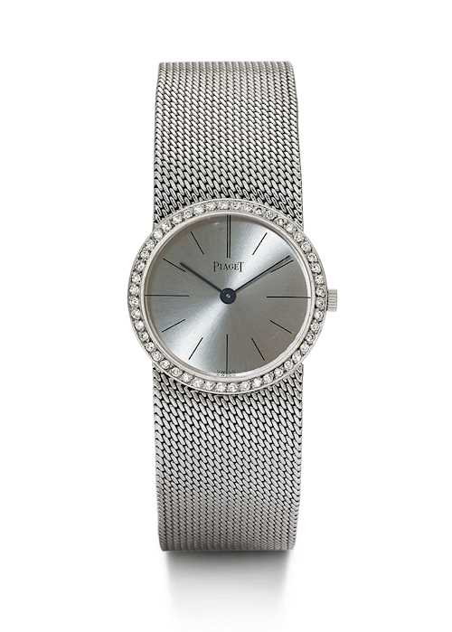 Piaget, elegant and flat Lady's wristwatch with diamond bezel.