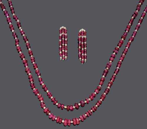 A PAIR OF PEARL AND RUBY SAUTOIRS, probably MEISTER, WITH EARCLIPS, MEISTER.